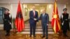Albanian Prime Minister Edi Rama (left) and his counterpart from North Macedonia, Dimitar Kovachevski, shake hands in Skopje on November 14.