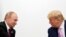 Путін (зліва) та Трамп (справа) під час зустрічі в Осаці