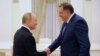 Russian President Vladimir Putin (left) meets with Bosnian Serb leader Milorad Dodik at the Kremlin in Moscow in September 2022.