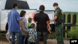 Мигранты на границе Мексики и США 
