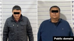 Кармалган милиция кызматкерлери. УКМК тараткан сүрөт.