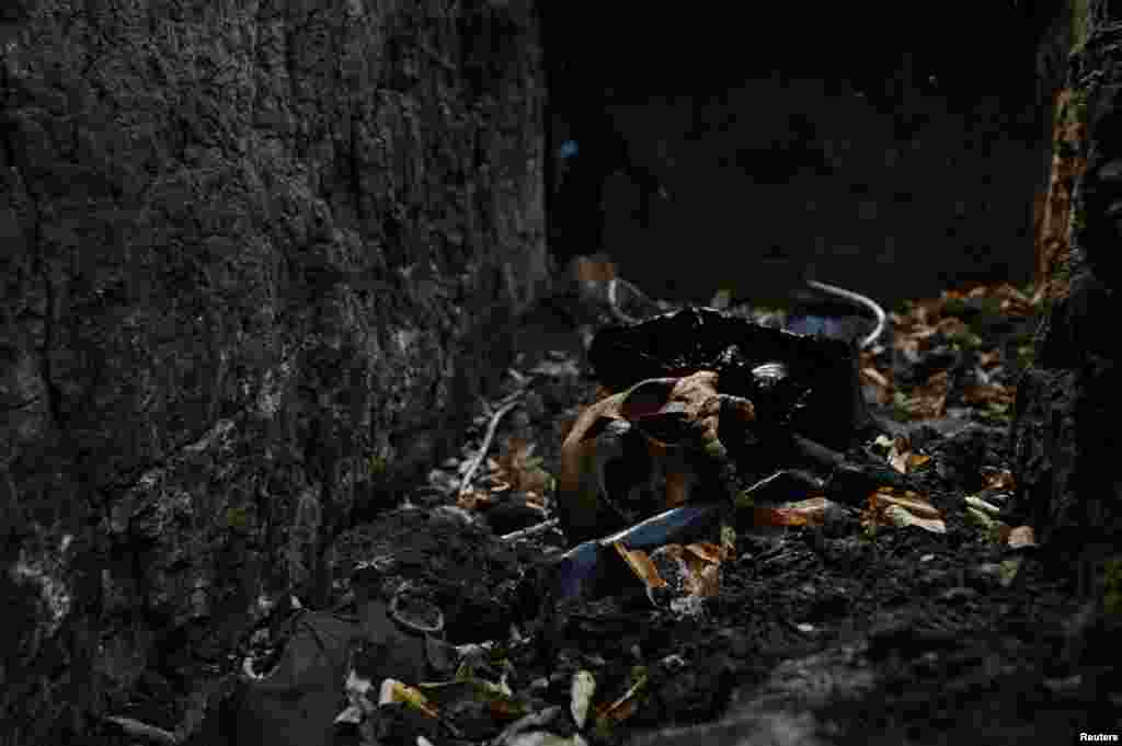 The skull of a Russian soldier is seen inside a trench near the village of Robotyne. In June 2023, Ukrainian soldiers captured these Russian positions, which allowed Kyiv&#39;s units to advance toward Robotyne.