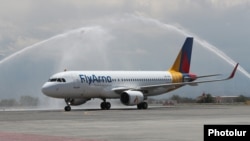 Armenia - A Fly Arna plane lands at Yerevan's Zvartnots airport on an inaugural flight, June 10, 2022.