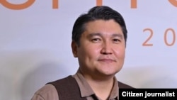 Адил Турдукулов.