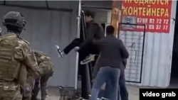 Интернетке тараган видеодон алынган кадр.