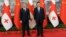 Georgian Prime Minister Irakli Gharibashvili (left) meets with Chinese President Xi Jinping in Beijing on July 28.