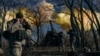 Ukrainian soldiers fire a self-propelled howitzer toward Russian positions near Bakhmut, Donetsk region, the epicenter of the war in Ukraine's eastern region of Donetsk.