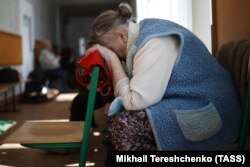 Женщина в пункте временного размещения