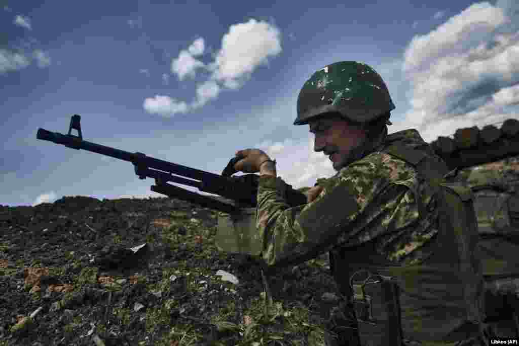 A Ukrainian soldier near the front line in Bakhmut. The 15 months of trench warfare have been described as a &quot;meat grinder&quot; by Prigozhin.&nbsp;Though military experts say the city has little strategic value, it has taken on great symbolic importance for both Kyiv and Moscow. &nbsp;