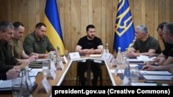 Among other things, Ukrainian President Volodymyr Zelenskiy (center) says he discussed the situation in the Black Sea with Odesa authorities. (file photo)