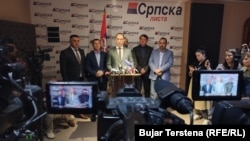 Ethnic Serb politician Igor Simic speaks to reporters on May 19. 