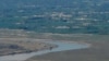 The Panj River forms part of the Tajik-Afghan border.