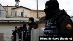 Turkish police stand guard outside the Italian Santa Maria Catholic Church after the shooting on January 28.