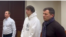 Vacio (center) appears in court in Moscow on December 22.