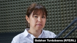 Нуриза Өмүрбаева.