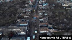 Пошкоджені російськими обстрілами будівлі в Миколаєві, лютий 2024 року