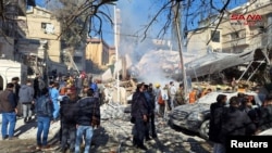 ویرانه ساختمانی که در دمشق هدف حمله قرار گرفت