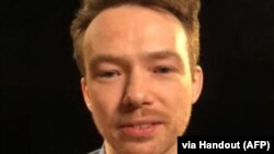 اسکرین‌شات از تماس تصویری یوهان فلودروس از زندان اوین که خانواده‌اش در اختیار خبرگزاری فرانسه قرار دادند 