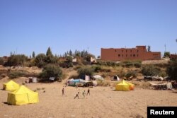 Турак жайы кыйрагандар үчүн тигилген чатырлар