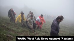 Իրան - Փրկարարները տարհանում են ավիաաղետի զոհերի դիերը, 20-ը մայիսի, 2024թ.