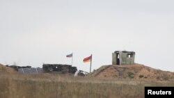 Armenia - An Armenian border guard post next to the Azerbaijani border guard post is seen from the village of Tegh in Syunik, September 21, 2023.