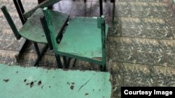 Ашканадагы эмеректер. Аравандагы интернат. Кыйноолорго каршы борбор тараткан сүрөт.