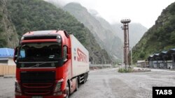 Russia - An Armenia commercial truck passes through the Russian-Georgian border crossing at Upper Lars, June 21, 2023: 