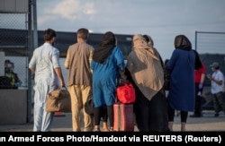 A group of Afghan refugees arrive in Toronto Pearson International Airport, Canada. in August 2021.