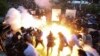 Armenia - A stun grenade fired by police explodes during an antigovernment protest in Yerevan, June 12, 2024.