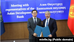 Алмаз Бакетаев жана Чжэн Ву.