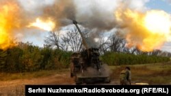 Ukrainian soldiers prepare to fire a 2C22 "Bohdan" self-propelled howitzer at Russian positions in eastern Ukraine.