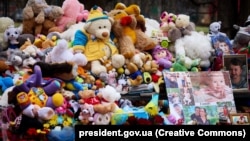  A memorial to the victims of a Russian strike that killed 12 people, including five children, in Odesa in March (file photo) 