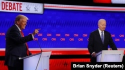 Данальд Трамп та Джо Байден під час дебатів 