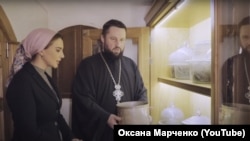 Оксана Марченко та архімандрит УПЦ (МП) Даміан (Радзіховський)