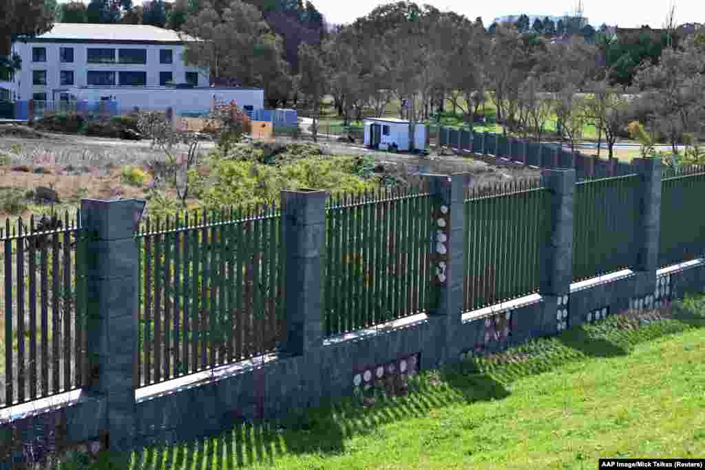 The temporary accommodation (right) is seen on the site that had been set aside for a new Russian embassy.&nbsp; The unusual standoff unfolded after Australia on June 15 canceled Russia&#39;s lease to build a new embassy on the Canberra land.&nbsp;