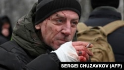 Scores Injured In Russian Ballistic Missile Strike On Kyiv