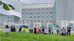 Members of the diaspora rally in front of the deportation center in Zurich on August 9.