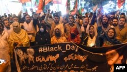 Supporters of former Prime Minister Imran Khan shout anti-government slogans during a protest in Quetta on August 5.