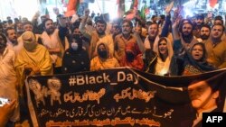 Supporters of former Prime Minister Imran Khan shout anti-government slogans during a protest in Quetta on August 5.