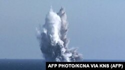 Түндүк Кореянын суу астында жүрүүчү аскердик дронду сыноо учурунда тартылды делген сүрөт. Март, 2023-жыл. 