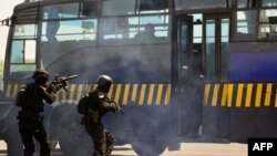 Полиция быстро нашла беглецов. Фото AFP.