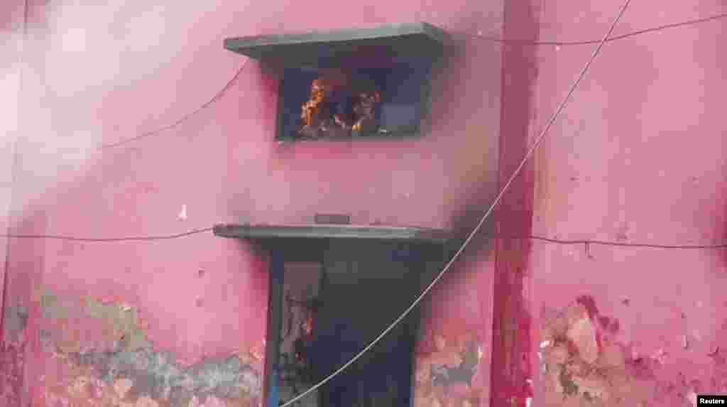 Fire burns inside a church.