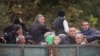 ARMENIA -Refugees from Nagorno-Karabakh ride in the back of a truck as they arrive in the border village of Kornidzor, September 26, 2023.