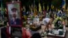 Natalya Zaichenko, 60, tends to the grave of her son, a Ukrainian soldier who was killed in the war against Russia, in Kyiv on August 3.