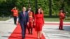 Kosovar President Vjosa Osmani (right) walks with Albanian President Bajram Begaj during her official visit to Tirana on September 4.