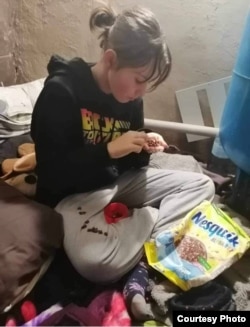 Катерина Шишкіна у підвалі будинку. Фото з особистого архіву родини