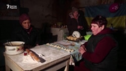 Жертөлені паналап отырған украин қарияларының күйбең тірлігі
 
