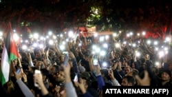 Газа ооруканасындагы каргашаны айыптаган ирандыктар. Тегеран. 18-октябрь, 2023-жыл.