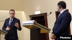 Armenia - French Defense Minister Sebastien Lecornu (left) speaks at a joint news conference with his Armenian counterpart Suren Papikian, Yerevan, February 23, 2024.