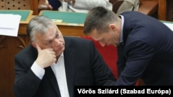 Hungarian Prime Minister Viktor Orban and cabinet chief Antal Rogan in their country's parliament. (file photo)
